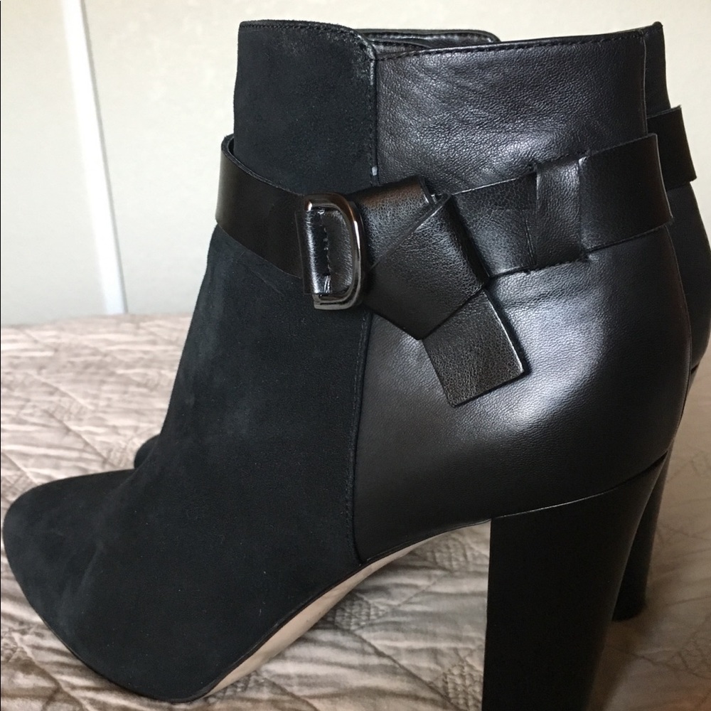 Black leather and suede ankle boots..